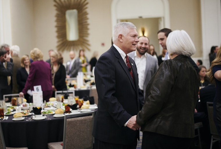 Congressman Pete Sessions speaks with an attendee during the Dallas Regional Chamber "Congressional Forum" in Dallas