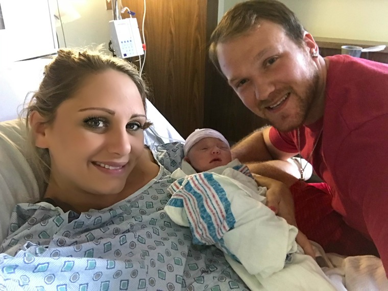 Meghan and John Koziel with their daughter, Kendra.