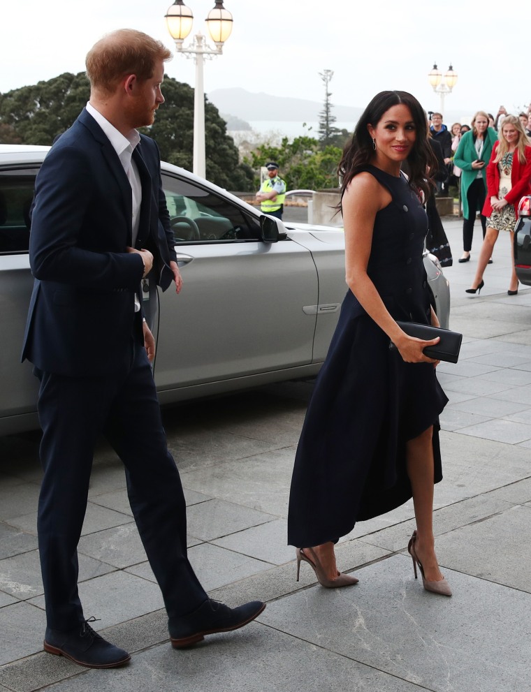 Meghan Markle asymmetrical hem dress