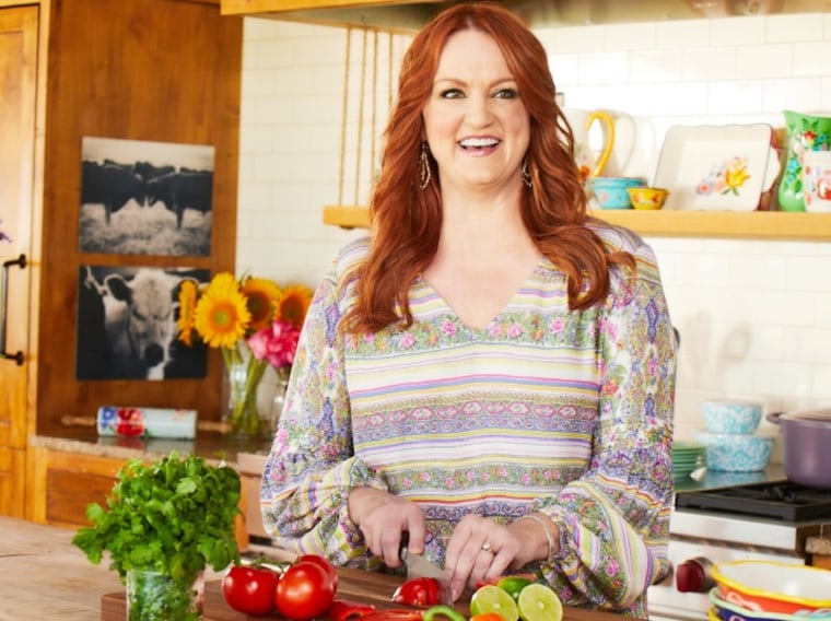 Ree Drummond slicing tomatoes in her kitchen
