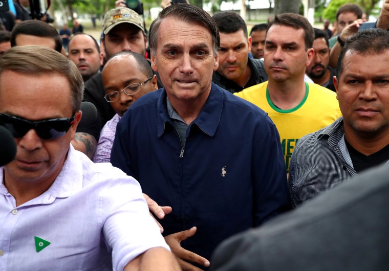 Image: Jair Bolsonaro, far-right lawmaker and presidential candidate of the Social Liberal Party (PSL), arrives to cast his vote in Rio de Janeiro