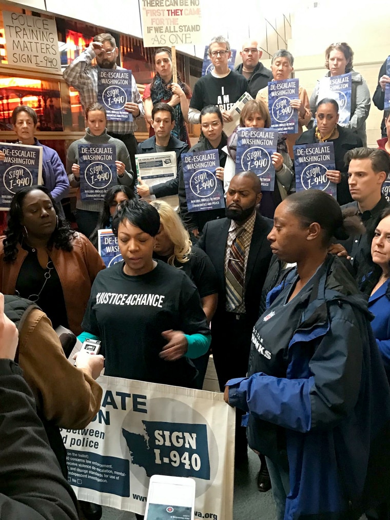 Alexis Dunlap, wearing a #Justice4Chance shirt, shares her story of losing her 17-year-old son during a press conference hosted by De-Escalate Washington and Not This Time, another activist organization. Her son was shot by police outside their apartment last January.