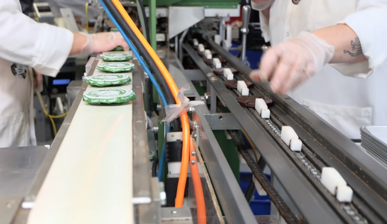 Employees wrap chocolate on the production in Taza's factory in Somerville, Massachusetts.