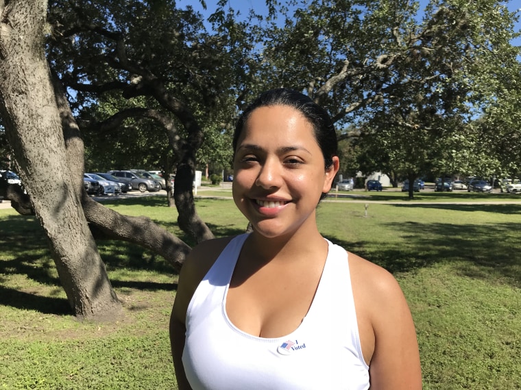 Patricia Jasso, 30, of Leon Valley, Texas wears an "I Voted" sticker after voting early.