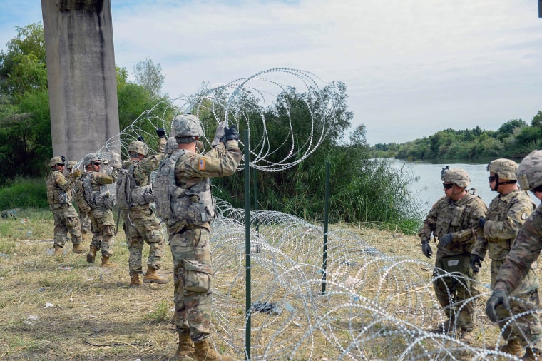 Image: U.S. soldiers work with U.S. Customs and Border Protection personnel at the Hidalgo, Texas