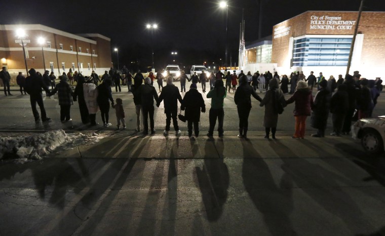 Image: Protestors block traffic outside the Ferguson