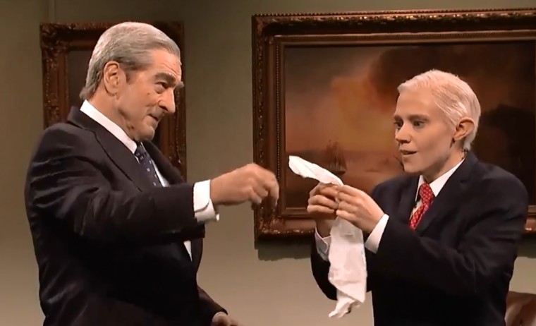 Robert Mueller (Robert DeNiro) gives Jeff Sessions (Kate McKinnon) a piece of toilet paper that was stuck to President Donald Trump's shoe during "SNL's" cold open.