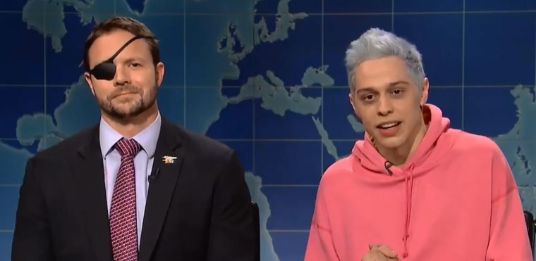 Lieutenant Commander Dan Crenshaw and Pete Davidson appear on SNL's "Weekend Update" on November 10, 2018.