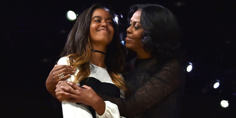 Michelle Obama says she played it cool on Malia's prom night