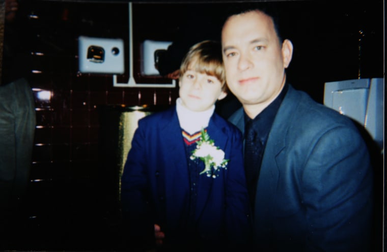 Jeffrey Scaperrotta takes a photo with Tom Hanks at the 1998 premiere of "You've Got Mail."