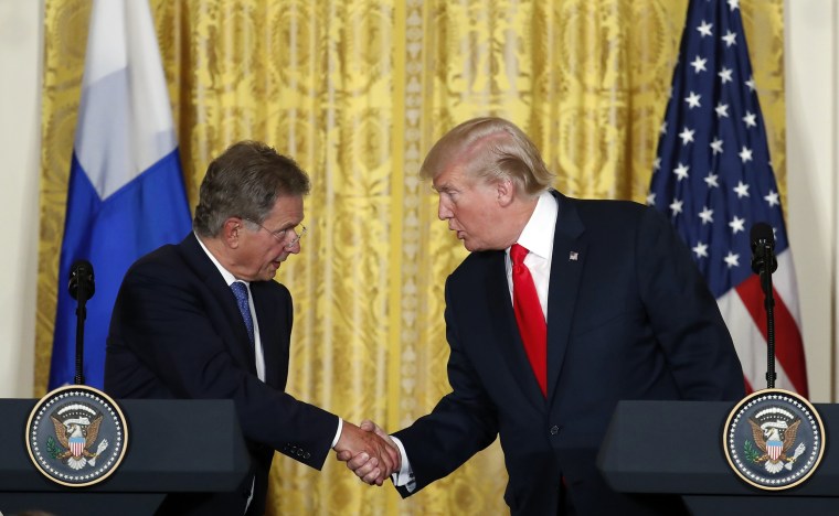 Image: Donald Trump shakes hands with Sauli Niinisto