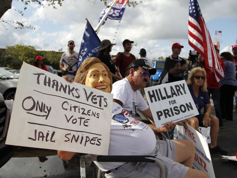 Image: Protesters gather outside of the Broward County Supervisor of Elections office during a recount