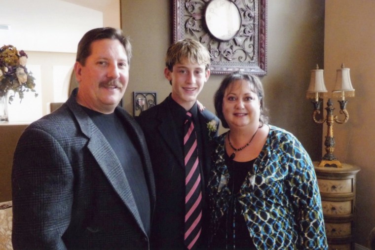 Image: Sgt Ron Helus with his wife Karen and son Jordan