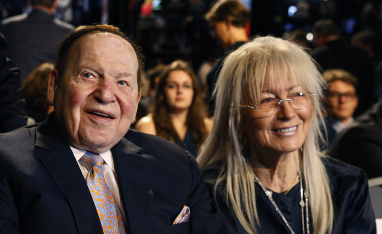 Sheldon Adelson and his wife Miriam wait for the presidential debate between Hillary Clinton and Donald Trump at Hofstra University in Hempstead, New York, on Sept. 26, 2016.