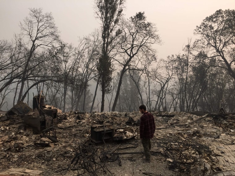 Jhonathan Clark near his house that was destroyed by the Camp Fire in Paradise, California, on Nov. 15, 2018
