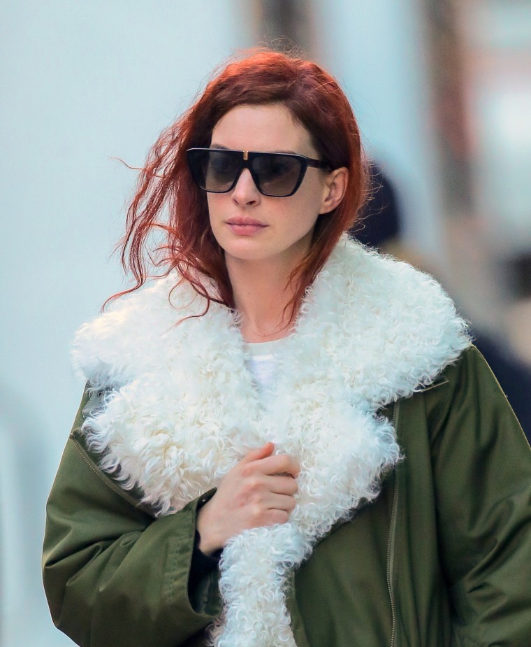 EXCLUSIVE: Anne Hathaway was spotted with red hair while filming a movie in New York City