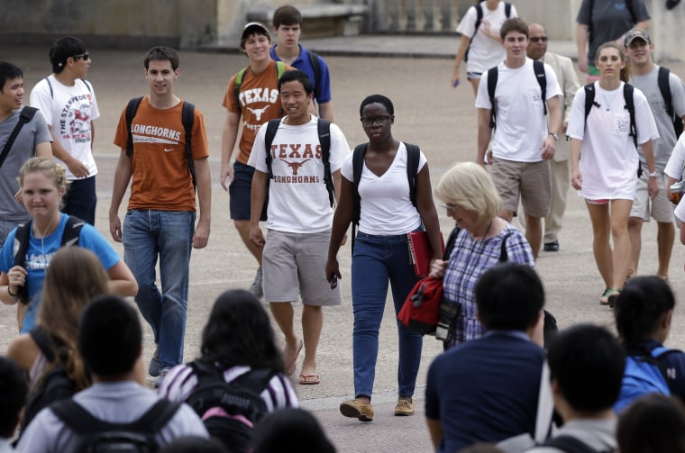 Image: Students walk through the University of Texas at Austin campus in Austin, Texas on Sept. 27, 2012.