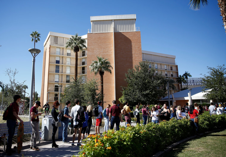 People line up to vote at the ASU Palo Verde West polling station during the midterm elections in Tempe