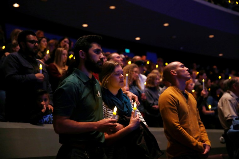 Mourners attend a vigil for families of victims of a mass shooting in Thousand Oaks, California