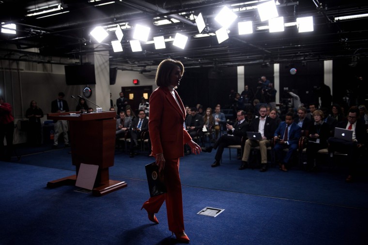 House Minority Leader Nancy Pelosi leaves after a briefing on Capitol Hill