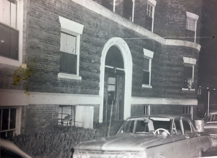 This police photo shows the outside of Jane Britton's apartment building near Harvard Square shortly after she was found dead in January 1969.