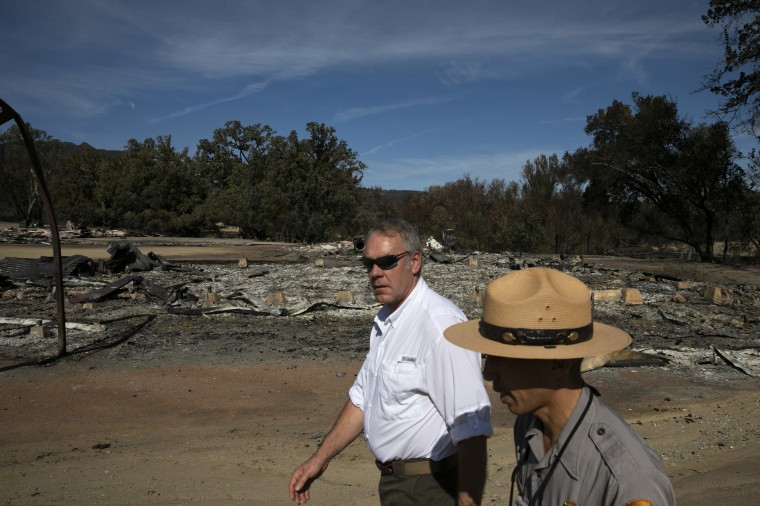 Secretary of the Interior Ryan Zinke visits the decimated Paramount Ranch in Agoura Hills, California, on Nov. 15, 2018. The landmark film location was burned to the ground by the Woolsey Fire.