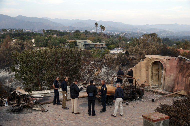 President Donald Trump visits a neighborhood impacted by the Woolsey Fire in Malibu, California, on Nov. 17, 2018.