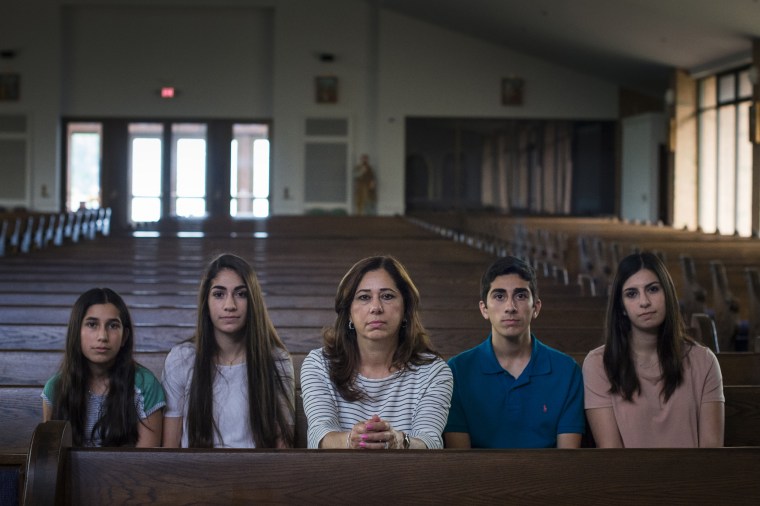 Nahrain Hamama and her four children in their church near Detriot, Michigan.