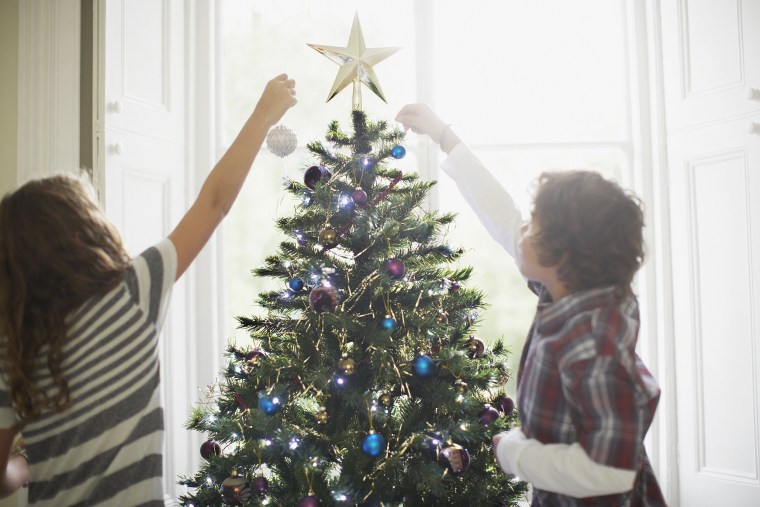 Image: Children decorating Christmas tree