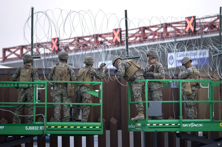 Image: United States military fortify border wall