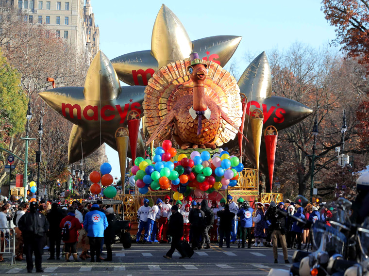 Image: A turkey float gets underway during the Macy's Thanksgiving Day Parade in Manhattan