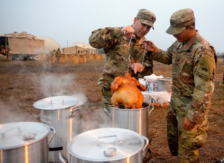 Image: U.S. Army soldiers prepare for Thanksgiving at Camp Donna in Donna