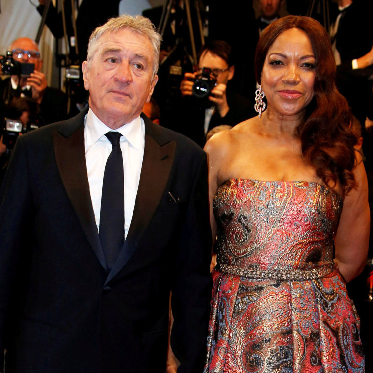 Image: FILE PHOTO: Cast member Robert De Niro and his wife Grace Hightower pose on the red carpet as they arrive for the screening of the film "Hands of Stone" out of competition at the 69th Cannes Film Festival in Cannes