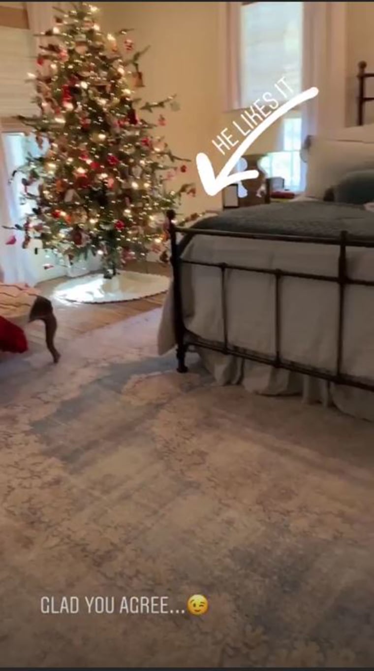 Joanna posted a video on Instagram showing the second Christmas tree in its place of honor ... the master bedroom!