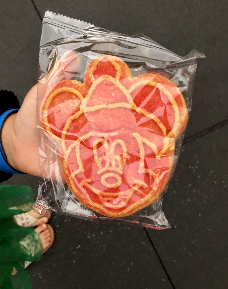 At Mickey's Very Merry Christmas Party, Disney cast members hand out unlimited cookies and hot chocolate.