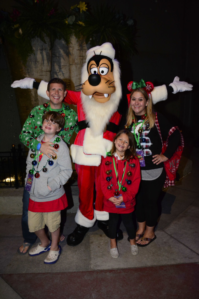 My family with Santa Goofy at the Jingle Bell, Jingle BAM! Dessert Party.