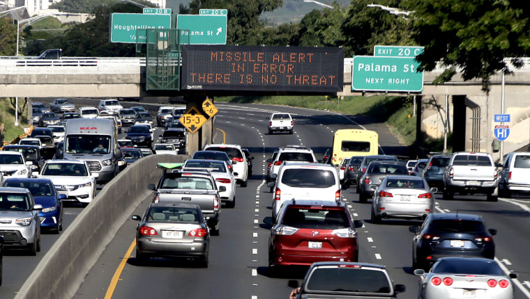 Image: Electronic signs displaying the emergency missile alert being fake in Honolulu on Jan. 13, 2018.