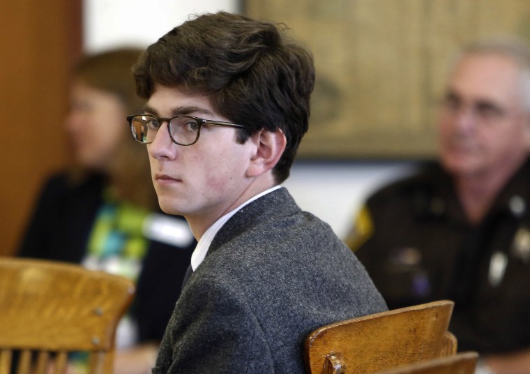 Image: St. Paul's School student Owen Labrie looks around the courtroom