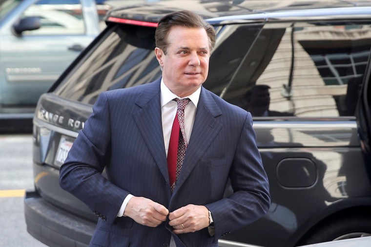 Image: Manafort arrives for arraignment on charges of witness tampering, at U.S. District Court in Washington
