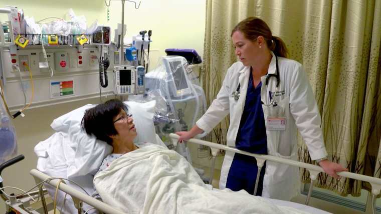 Dr. Cori Poffenberger with a patient.