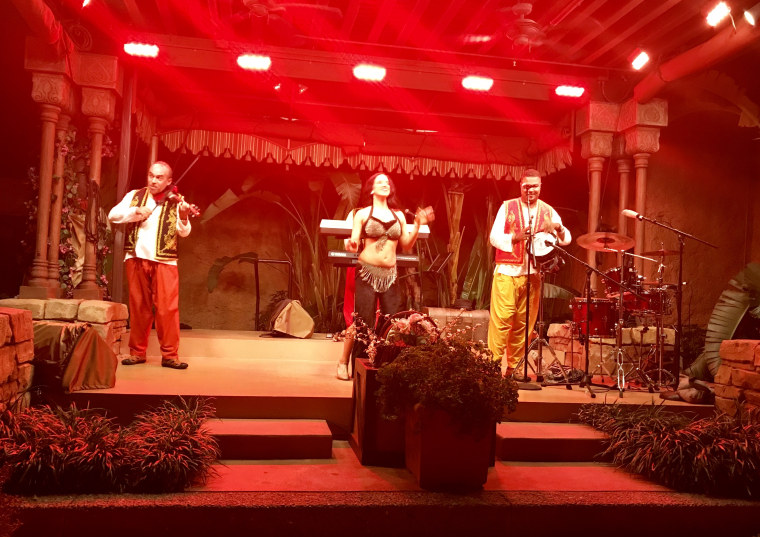 These performers at Epcot's Morocco pavilion shared holiday songs and dances from the stage.