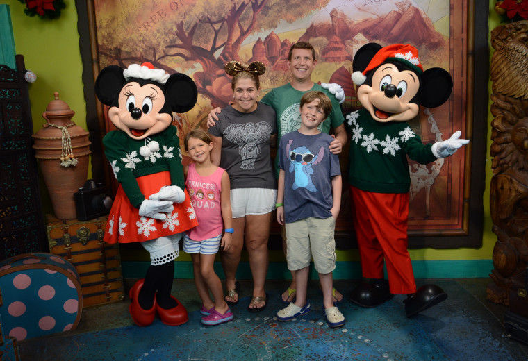 Mickey and Minnie wear their holiday best for their meet and greet at Disney's Animal Kingdom.