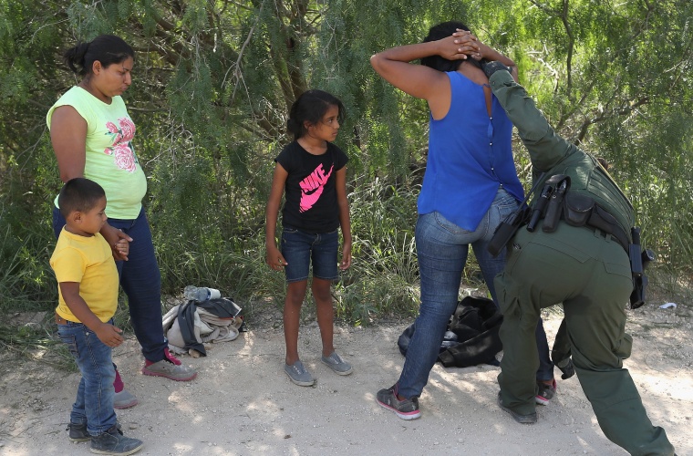 Border Patrol Agents Detain Migrants Near US-Mexico Border
