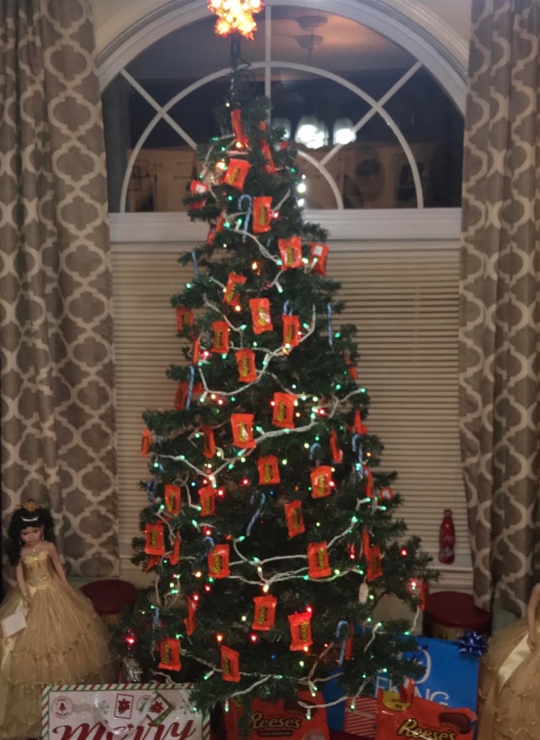The Sales family Christmas tree is decorated with Reese's.