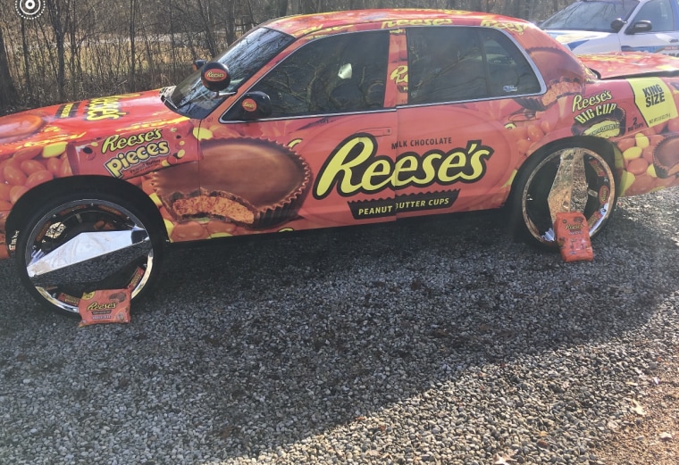 Lavoy Sales' car is decked out in a Reese's car wrap.
