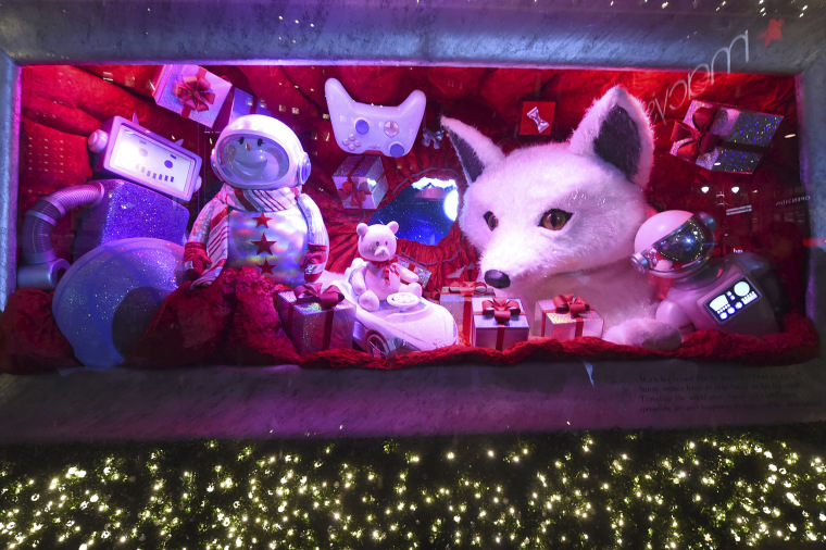 Macy's Herald Square unveils its legendary Christmas windows celebrating the theme \"Believe In The Wonder Of Giving,\" Thursday, Nov. 15, 2018, in New York. The six enchanted windows share a tale of friendship, family, adventure, and teamwork as Sunny the Snowpal works to save Christmas with the help of her friends.