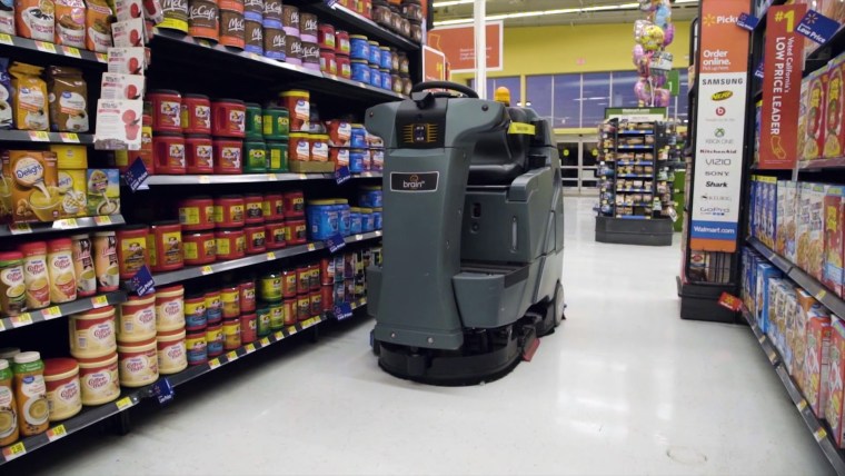 Walmart's BrainOS-powered floor scrubbers are equipped with sensors to clean around customers.