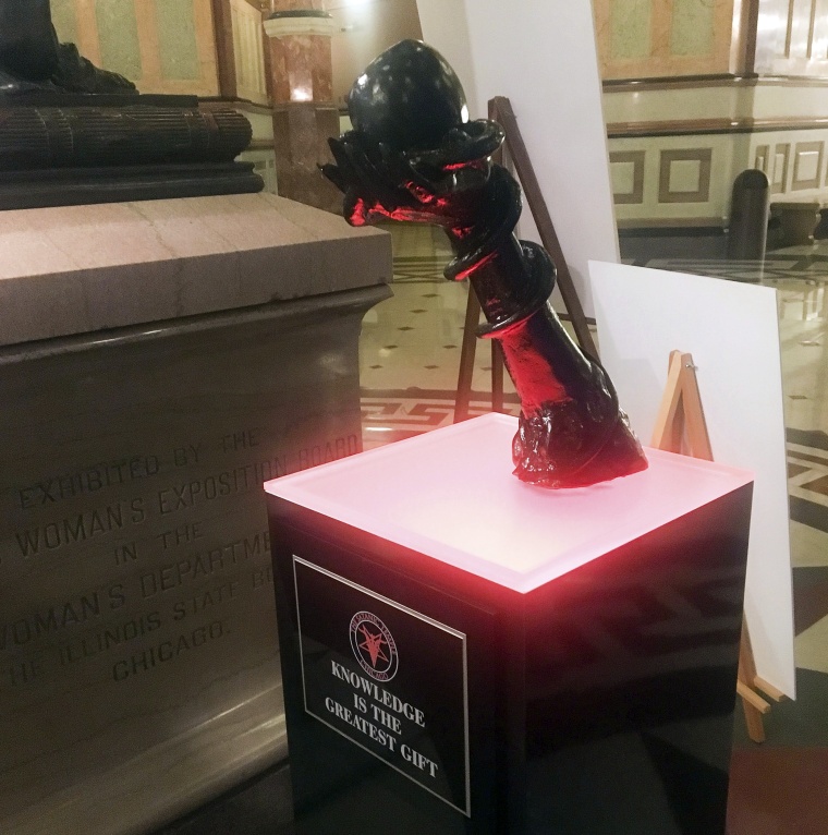 Satanic statue erected in Illinois State Capitol with other