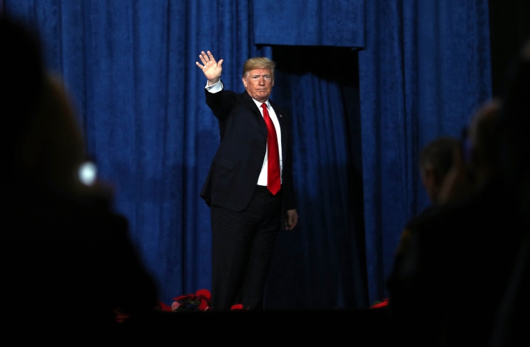 Image: President Donald Trump waves to the crowd after addressing the Project Safe Neighborhoods National Conference In Kansas City, Missouri, on Dec. 7, 2018.