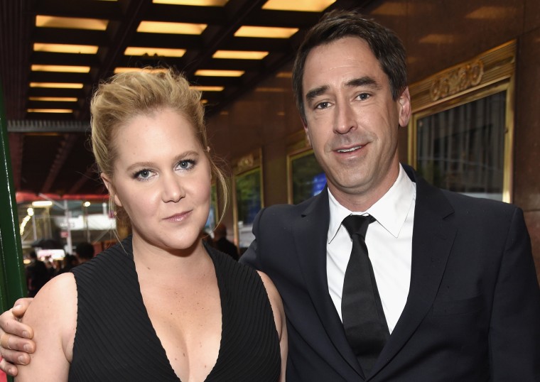 Amy Schumer and Chris Fischer